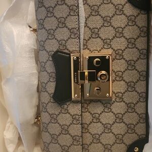 Gucci Black and Gold Crossbody Bag with Vintage-Inspired Hardware
